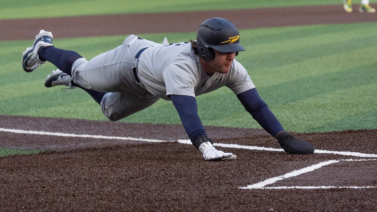 Toledo’s Luke Walton scores a run against Oregon in a game on Feb. 14, 2025.