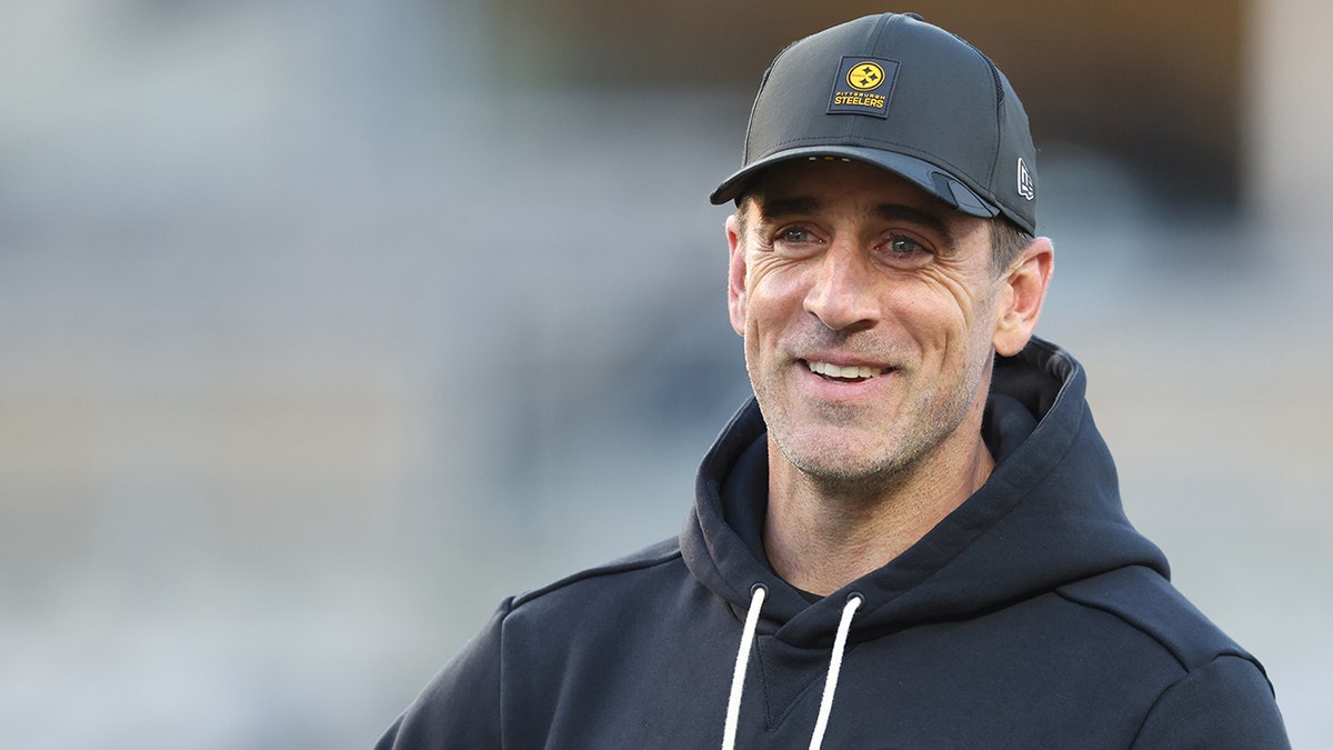 Aaron Rodgers smirks