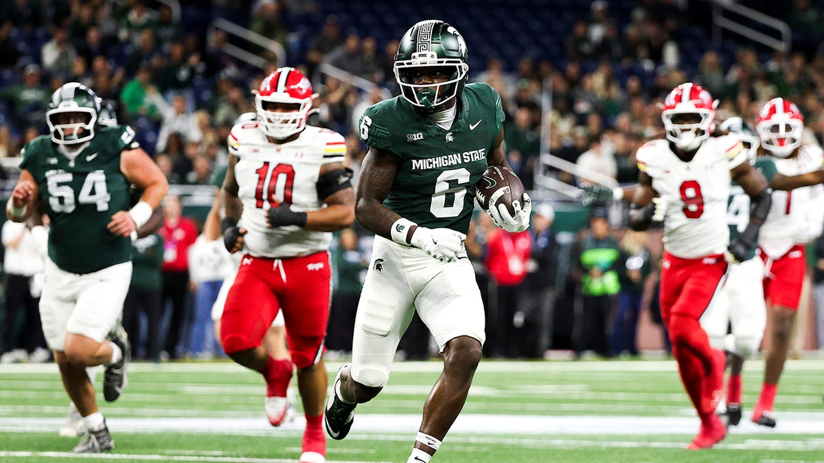 Nick Marsh carries the ball