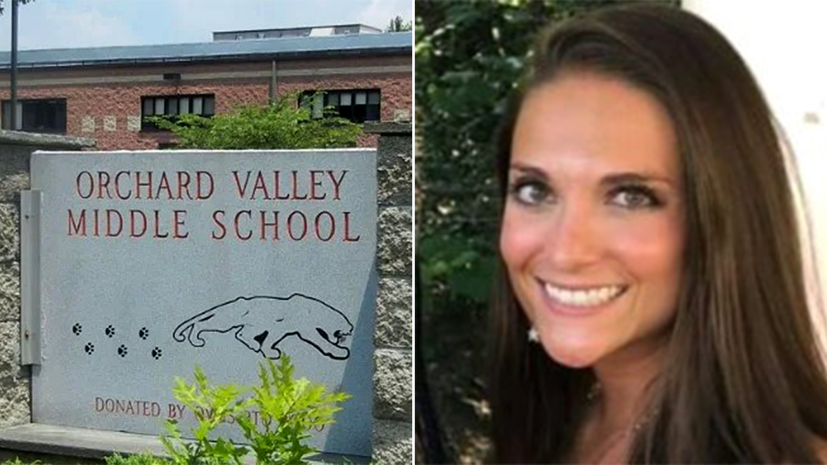 Ashley A. Fisler standing in front of Orchard Middle School
