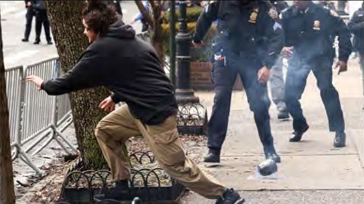 Suspect allegedly throwing improvised explosive device during ISIS-inspired attack in Manhattan