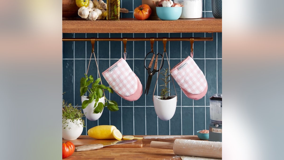 These mitts add some festive color to your kitchen.