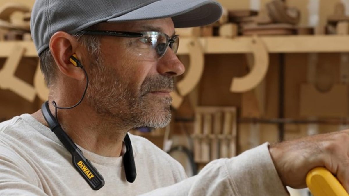 You can listen through earbuds or with the open-ear neckband. 