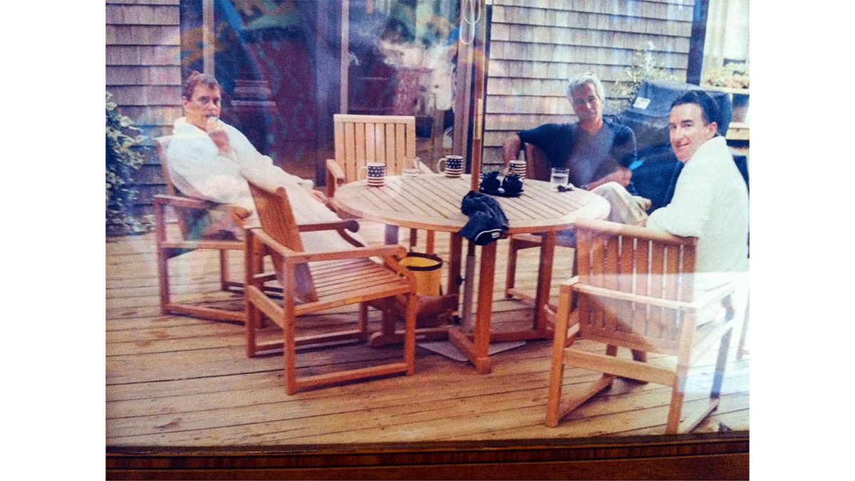 A photo of Andrew Mountbatten-Windsor with Jeffrey Epstein and Peter Mandelson.