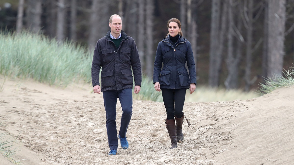 Prince William and Kate Middleton going on a hike.