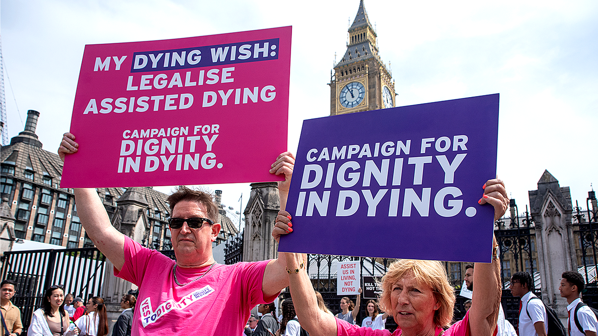 Death with Dignity campaigners holding signs