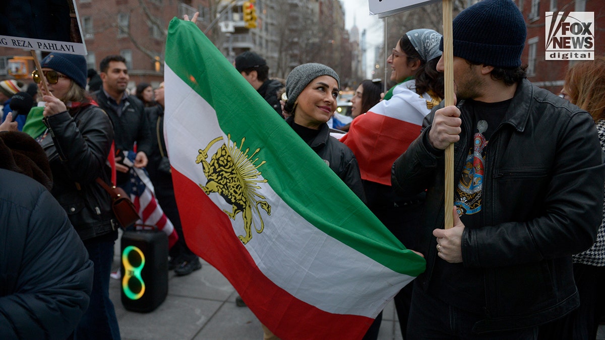 Pro-Khamenei and anti-Khamenei protesters clashing during a demonstration at Washington Square Park.