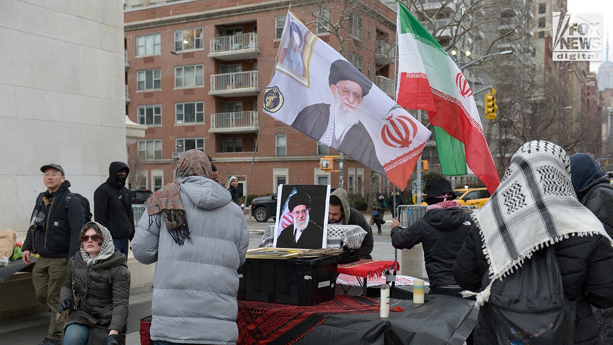 Pro-Khamenei and anti-Khamenei protesters clashing during a demonstration at Washington Square Park.