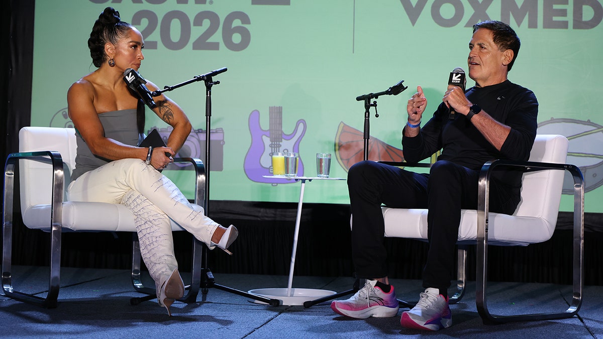 Robin Arzón and Mark Cuban speak on stage for the "Project Swagger podcast with Robin Arzón" podcast featuring Mark Cuban at the Vox Media Podcast Stage at SXSW on March 13, 2026 in Austin, Texas.