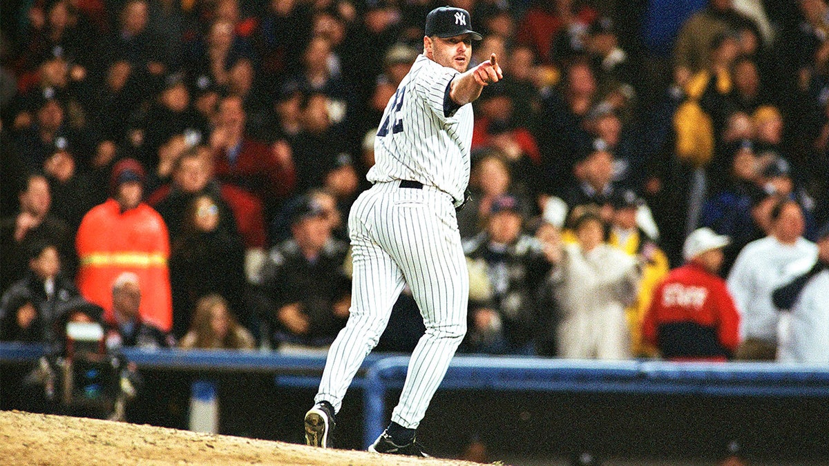 Roger Clemens pitches for New York Yankees during 2001 World Series game.