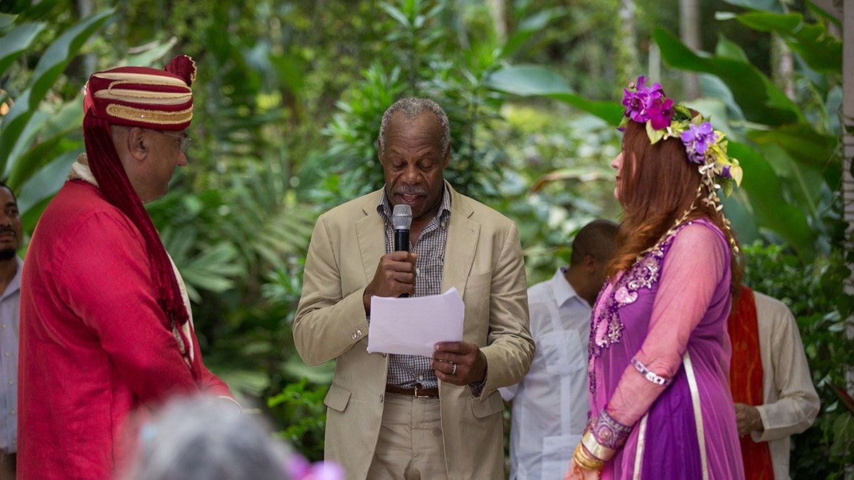Actor Danny Glover, CodePink co-founder Jodie Evans and Neville Roy Singham at wedding celebration in Jamaica