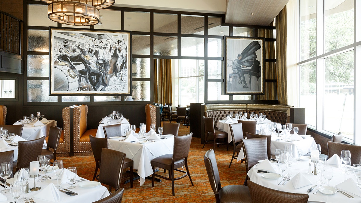 The dining room at Ruth's Chris Steakhouse at its new location in the Galleria, Tuesday, July 16, 2013, in Houston. The restaurant will open to the public July 22. ( Michael Paulsen / Houston Chronicle ) (Photo by Michael Paulsen/Houston Chronicle via Getty Images)