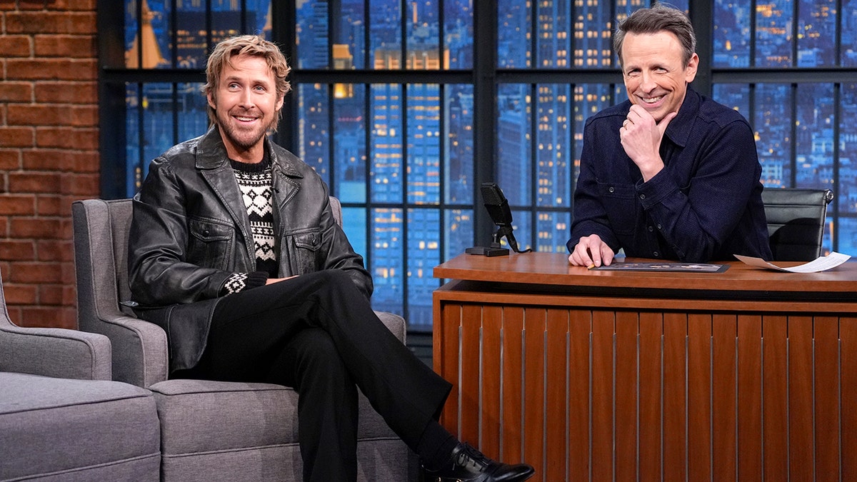 Ryan Gosling and Seth Meyers are pictured on set of "Late Night with Seth Meyers."
