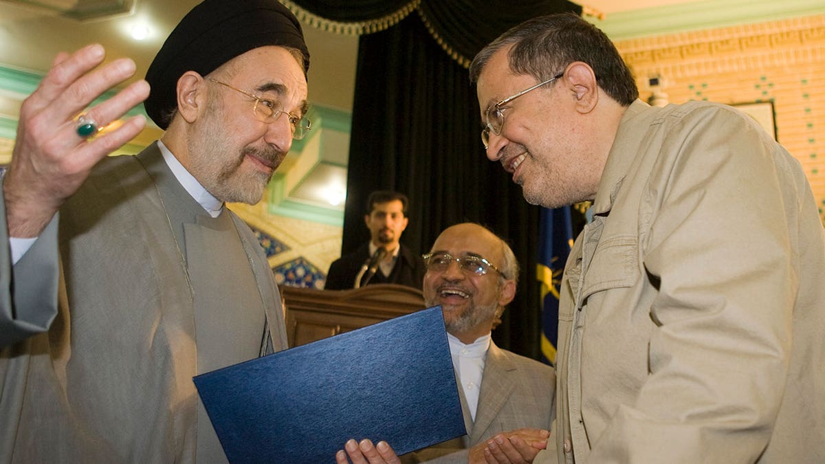 Former Iranian President Mohammad Khatami (L) and reformist politician Saeed Hajjarian 