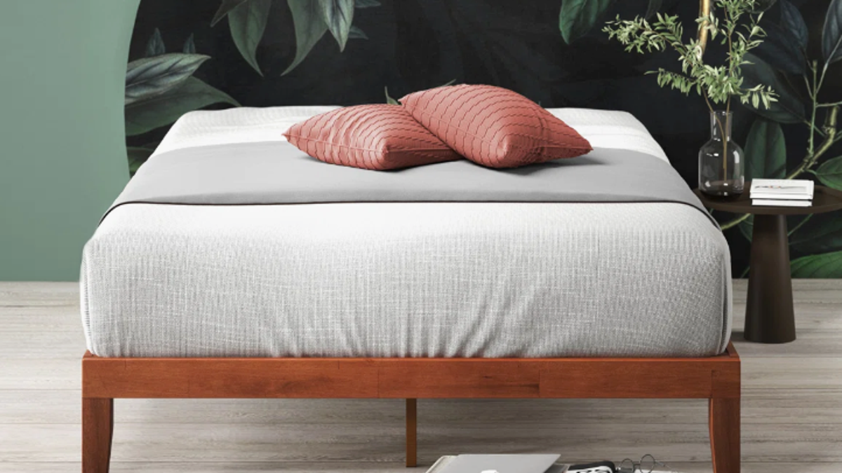 This modern bed frame sits tall for underneath storage.