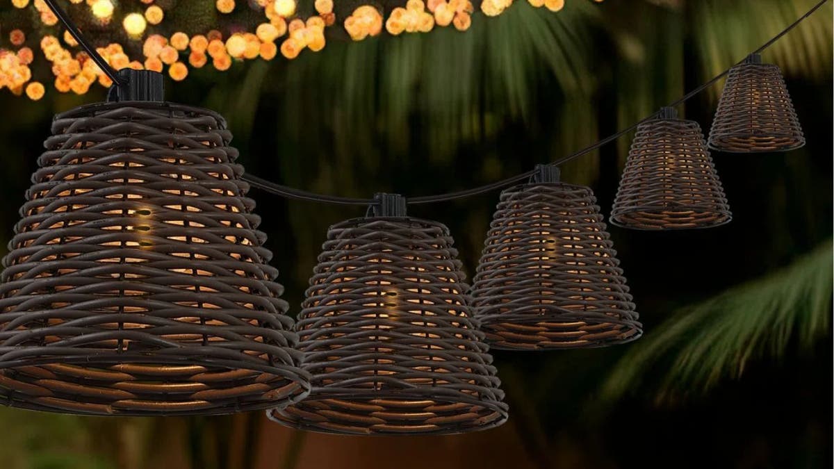 Add soft lighting to your outdoor space with these rattan-shaded string lights.
