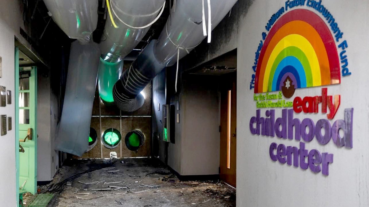 A damaged hallway in the childcare center of Temple Israel