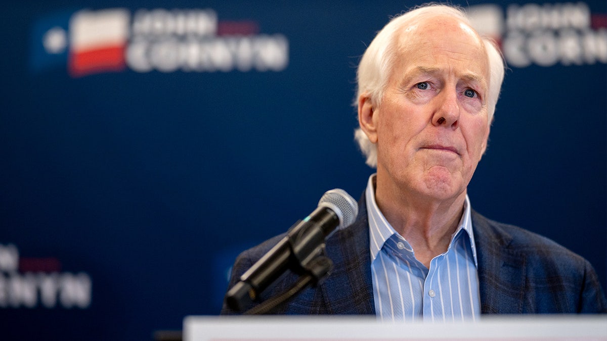 Sen. John Cornyn speaks to reporters in Austin.
