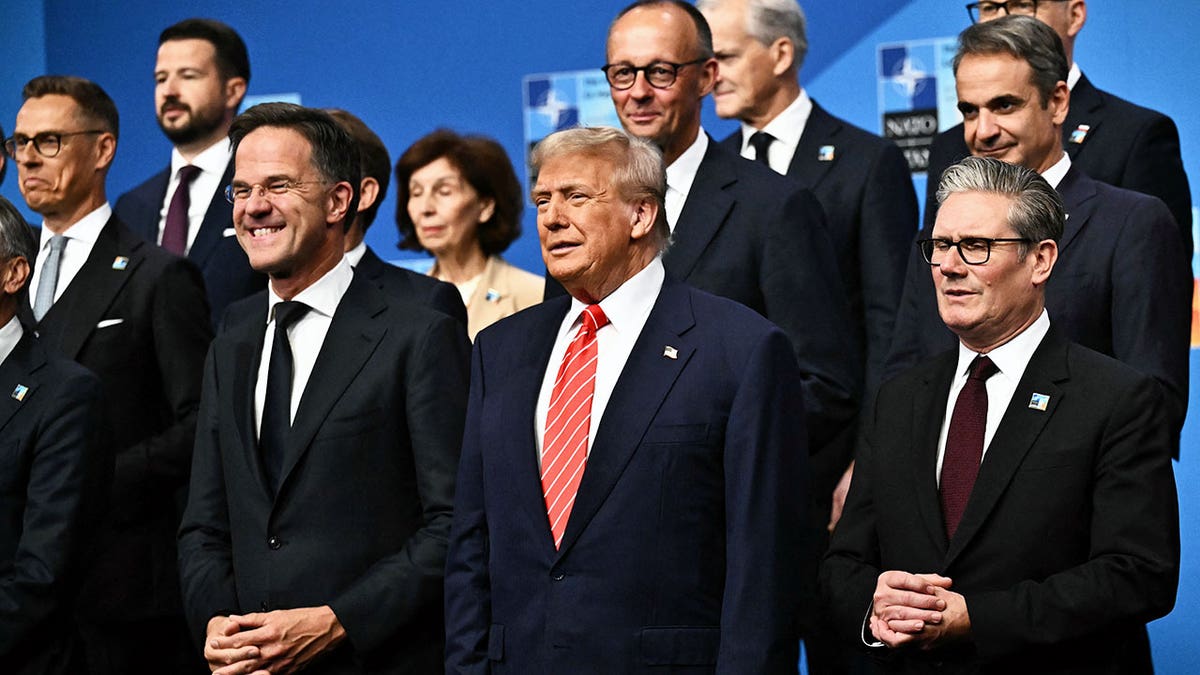 President Donald Trump pose with NATO country leaders