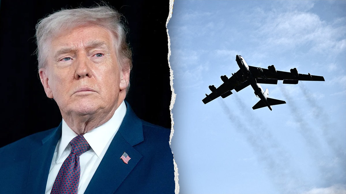 President Donald Trump standing next to a U.S. military B-52 plane