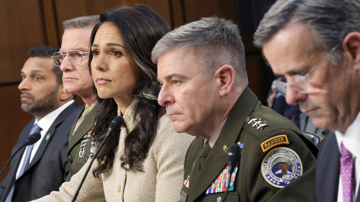 U.S. intelligence and defense leaders sit before a Senate panel while testifying about global security threats on Capitol Hill.
