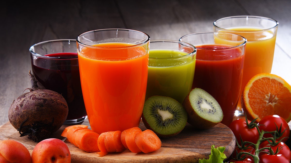 Glasses with fresh organic vegetable and fruit juices. Detox diet