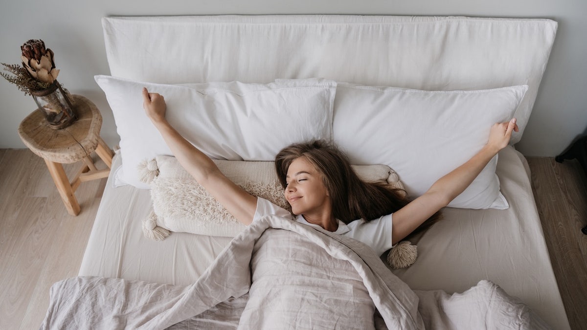 girl waking up in bed