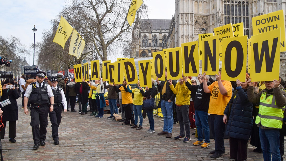 What did you know protest sign