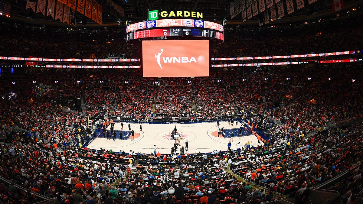 WNBA logo displayed on jumbotron inside TD Garden arena in Boston