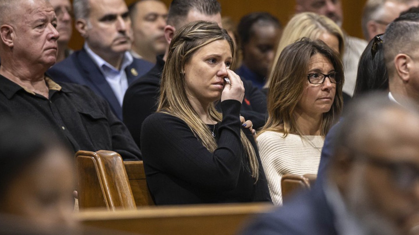 Widow of slain NYPD officer breaks down as sea of officers flood courtroom