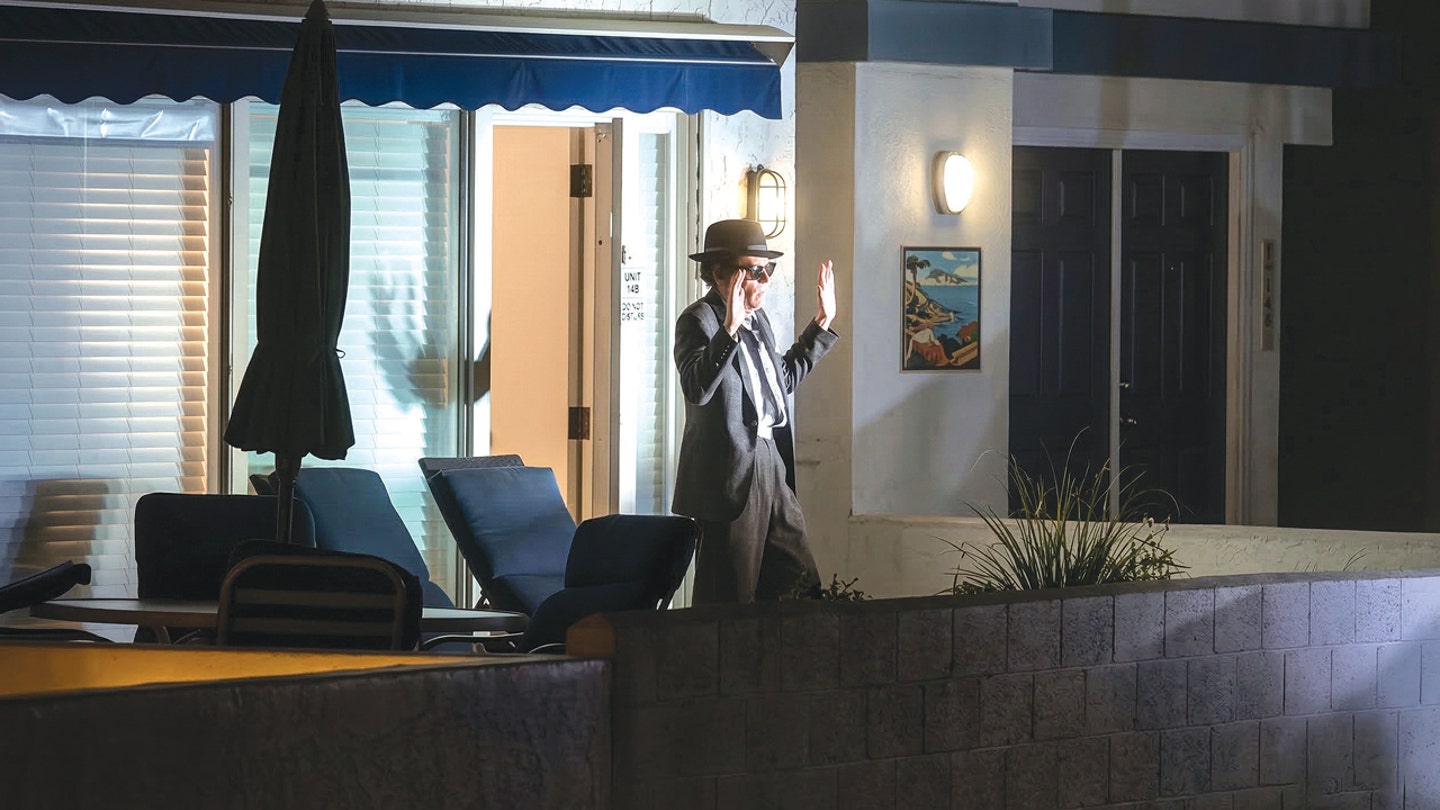 Millionaire developer found dead in ritzy beach home; bizarrely dressed suspect arrested after standoff