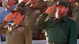 Fidel Castro and his brother Raul Castro attending a parade in Havana Cuba