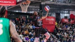 Jumpin Ballard scores a basket for Harlem Globetrotters