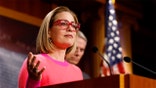 WASHINGTON, DC - NOVEMBER 29: U.S. Sen. Kyrtsen Sinema (D-AZ) speaks at a news conference after the Senate passed the Respect for Marriage Act at the Capitol Building on November 29, 2022 in Washington, DC. In a 61-36 vote, the measure would provide federal recognition and protection for same-sex and interracial marriages. (Photo by Anna Moneymaker/Getty Images)