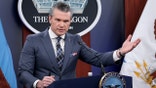Pete Hegseth delivers remarks during a Pentagon press briefing on ongoing military operations in Iran.