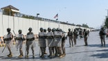 Authorities clash with protesters and the situation turns violent.