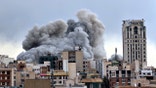 plume of smoke rises in city of Tehran