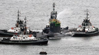 Iranian man, Romanian woman charged after allegedly trying to enter UK nuclear missile base, officials say