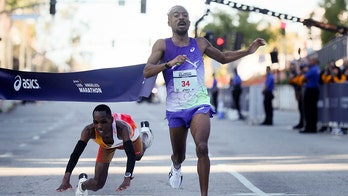 Michigan high school coach wins Los Angeles Marathon in dramatic photo finish