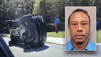 Tiger Woods released from jail after DUI arrest; eyes appear bloodshot in booking photo