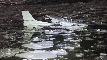 Pilot, passenger swim to safety after plane crashes into New York river