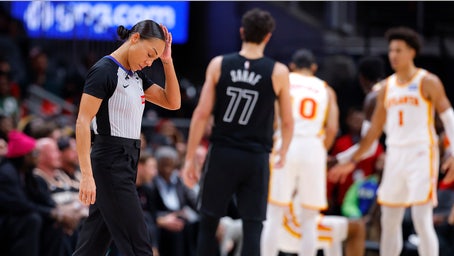 NBA official Sha'Rae Mitchell slams into cameraman in brutal mid-game collision