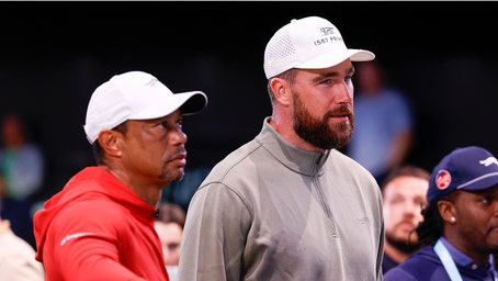 Travis Kelce chats with Kai Trump at Tiger Woods' TGL golf league