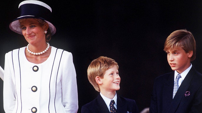 Princess Diana smirking as Prince Harry smiles at Prince William.