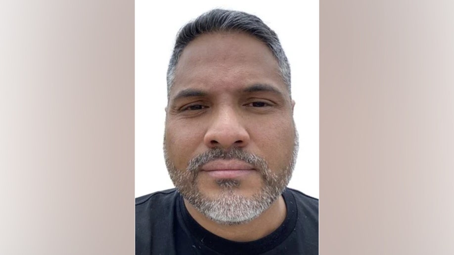 Alternate FBI booking photo of Anibal Alexander Canelon Aguirre