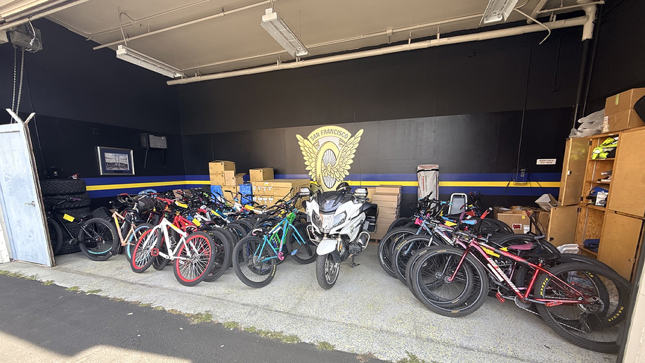 CHP officers load   confiscated bicycles into motortruck  aft  Bay Bridge takeover attempt