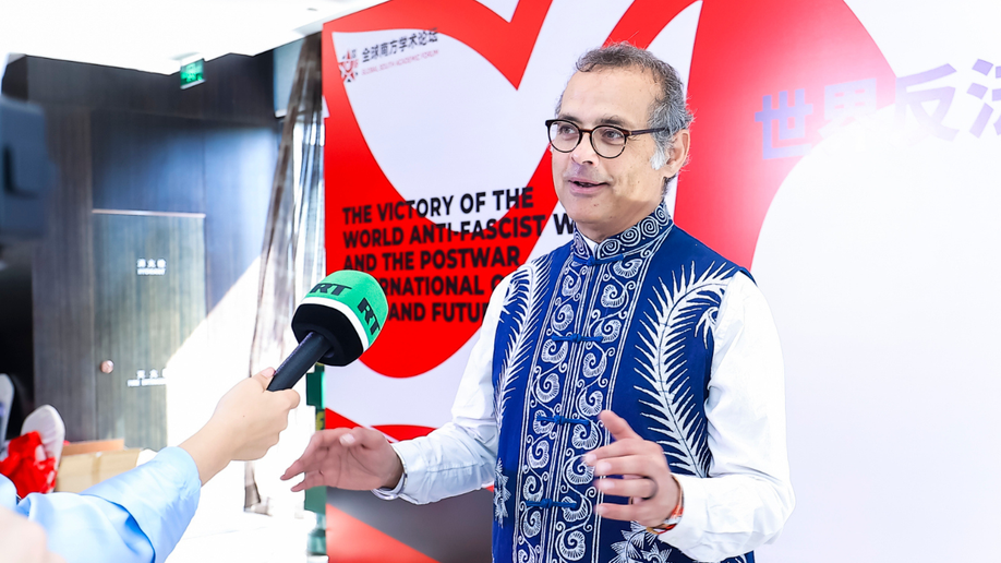 Vijay Prashad astatine  Global South Academic Forum, wherever  Neville Roy Singham spoke