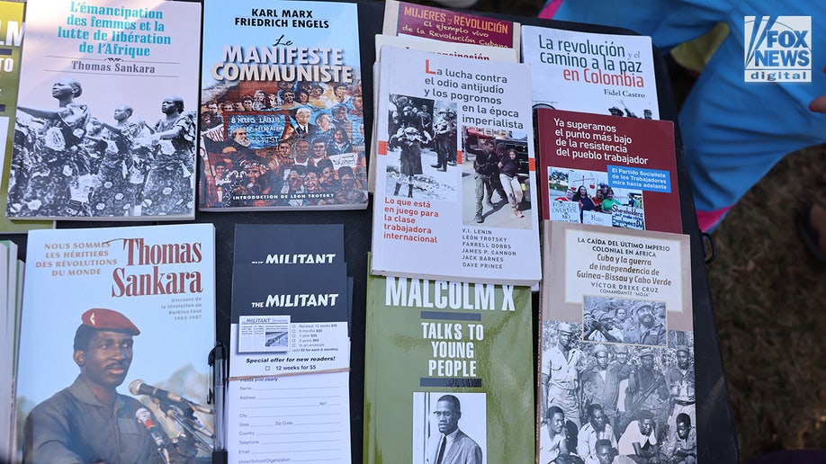 Protesters gathering with communist and socialist reading materials in front of the Minnesota State Capitol building