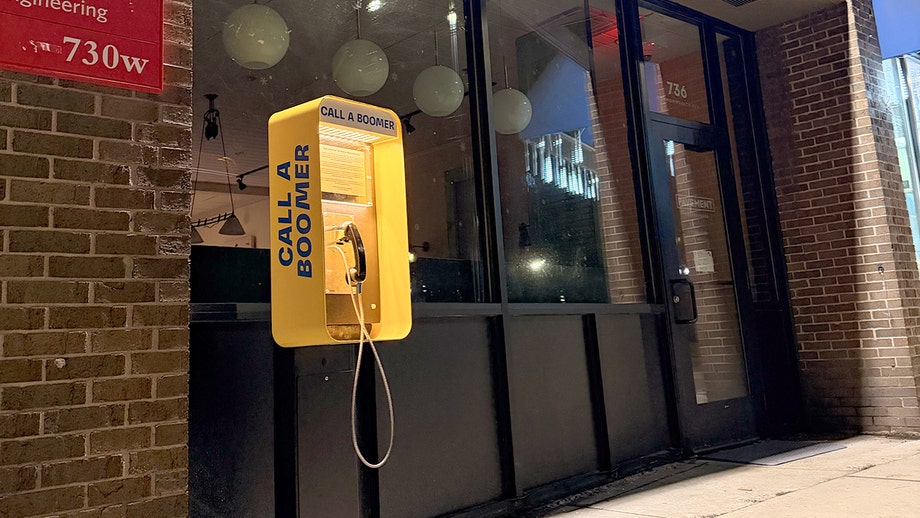 'Call a Boomer' payphones help cure loneliness, spark friendships across generations