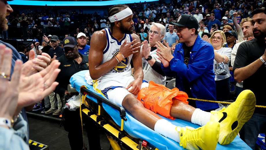 Warriors' Moses Moody leaves game on stretcher after suffering gruesome injury on dunk attempt